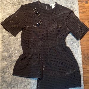 H&M black asymmetrical partially transparent blouse size 2 (XS)